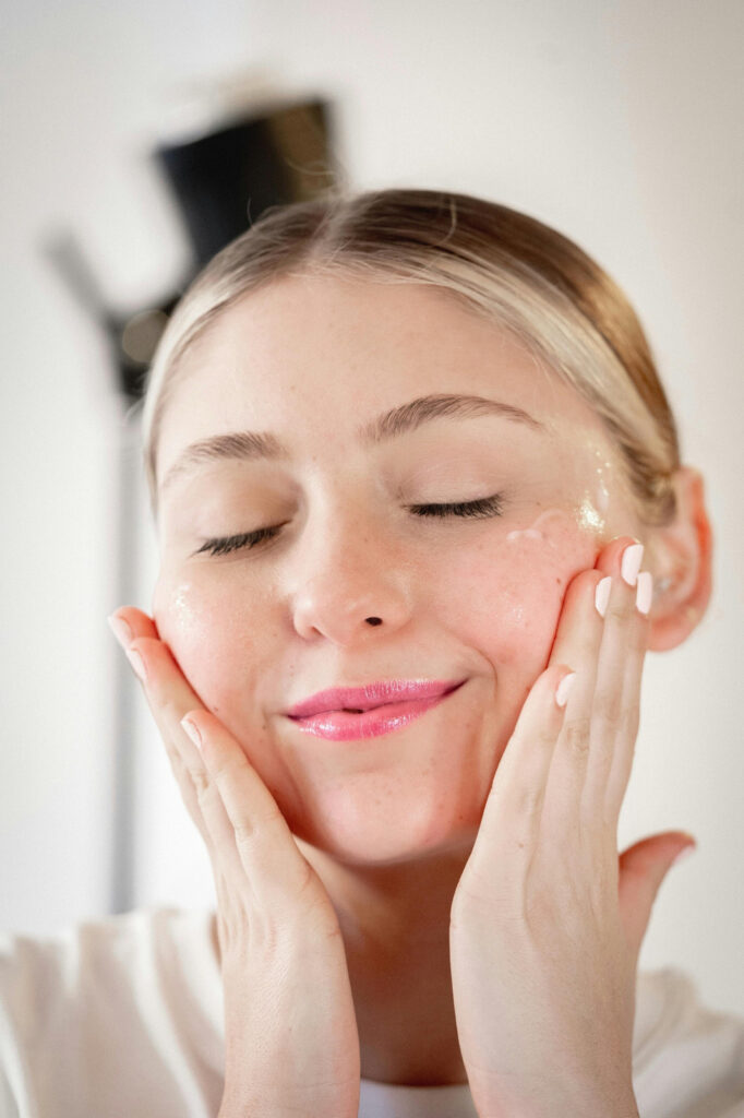 practicing-skincare-routine-with-cream