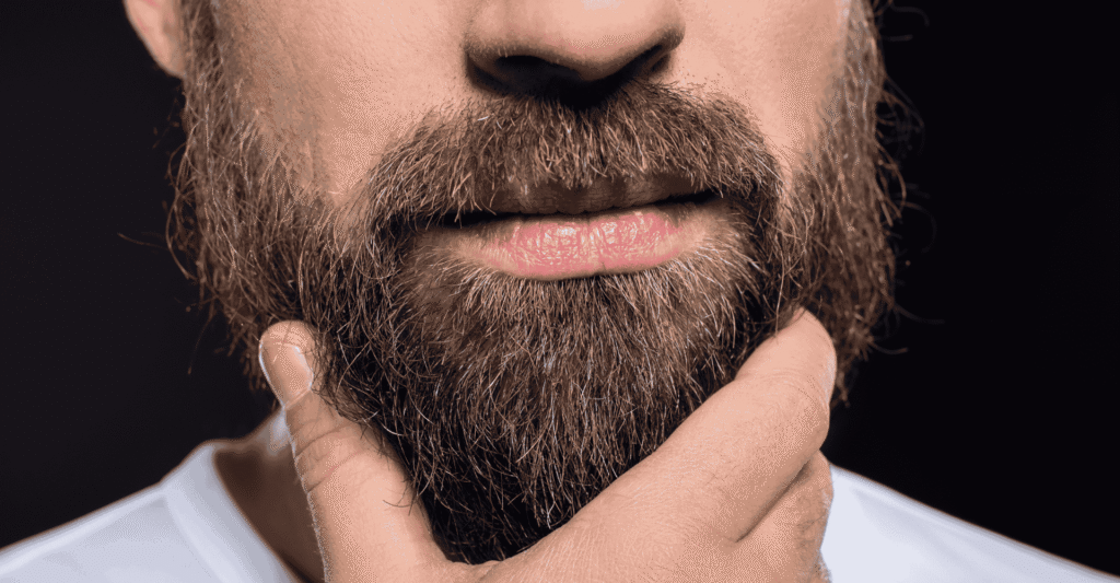 Man touching his beard